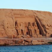 Facade of the Abu Simbel temples carved into the sandstone cliff