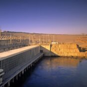 Aswan High Dam power station beside the Nile at golden hour