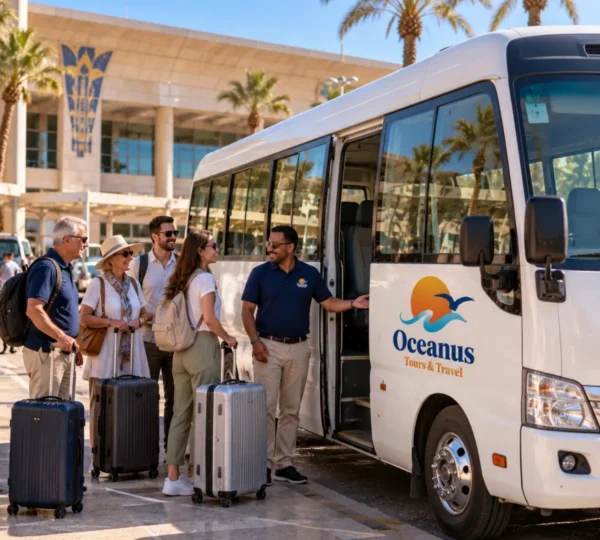 Oceanus Tours & Travel minibus welcoming tourists with luggage at Luxor International Airport